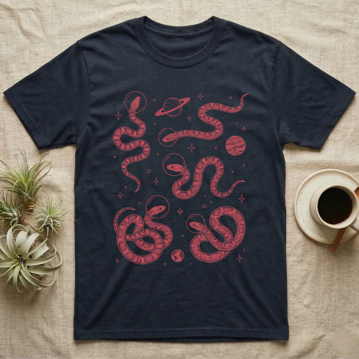 Corn Snake Cosmic T-Shirt in Navy — Vintage screen-print illustration of corn snakes in astronaut helmets floating in space, cosmic crimson monochromatic on dark background.