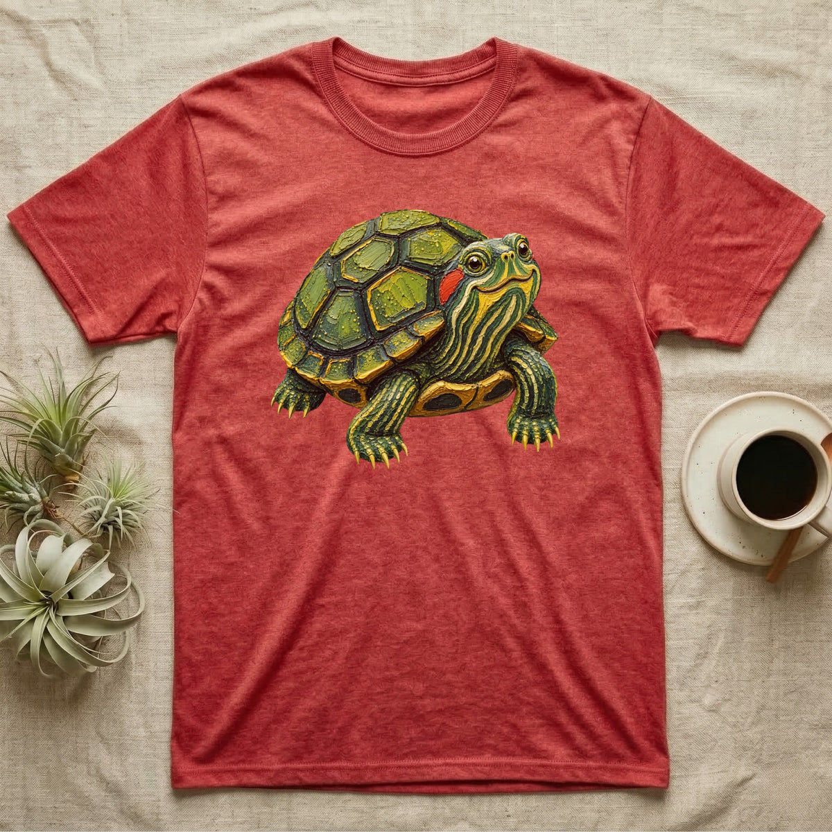 Red t-shirt with a watercolor-style painted turtle graphic.