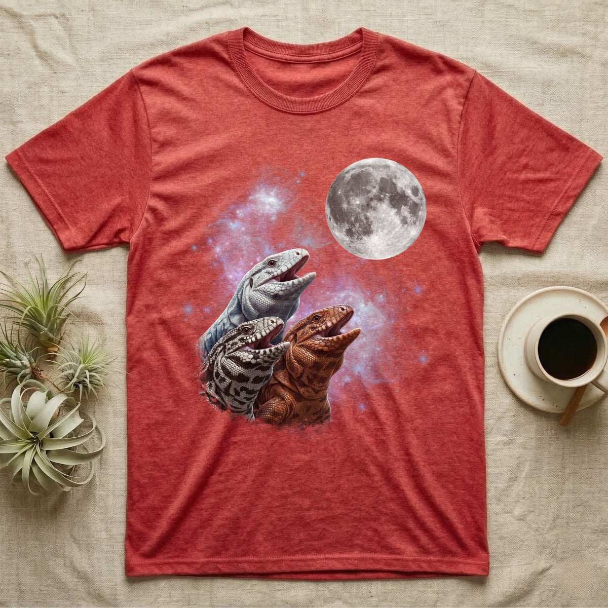 Tegu Moon Howl T-Shirt in Heather Red — Three Tegu colour morphs howling at a full moon over a nebula on a dark grey t-shirt.