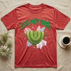 Green Tree Python Feral T-Shirt in Heather Red — Green tree python in a saddle coil on a branch under a jagged emerald metal "LOOK DON'T TOUCH" wordmark and orchids.