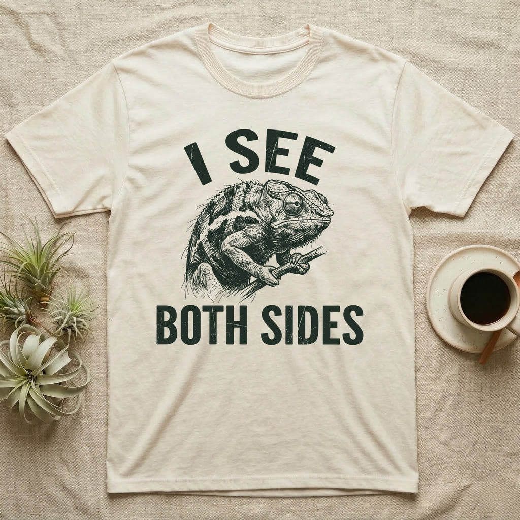 Panther Chameleon Mediator T-Shirt in Natural — Etching of a panther chameleon holding a twig, its eyes pointing opposite ways, under I SEE, above BOTH SIDES