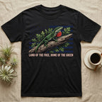 Green Anole 1776 T-Shirt in Black — Realistic green anole with a red dewlap on a branch over a distressed flag under text Land of the Free, Home of the Green.