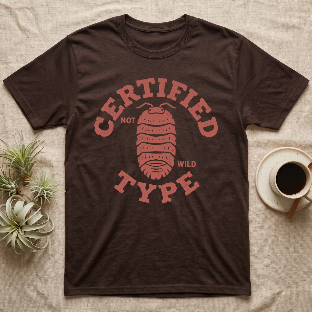 Isopod Certified Morph T-Shirt in Dark Chocolate — Carved block-print isopod seen from above inside a ring of terracotta lettering reading CERTIFIED NOT WILD TYPE.