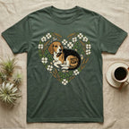 Beagle dog illustration inside a heart of flowers and wheat on a green t-shirt.