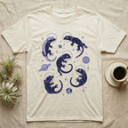 Crested Gecko Cosmic T-Shirt in Natural — Vintage screen-print illustration of crested geckos in astronaut helmets floating in space, deep cosmic indigo monochromatic on dark background.