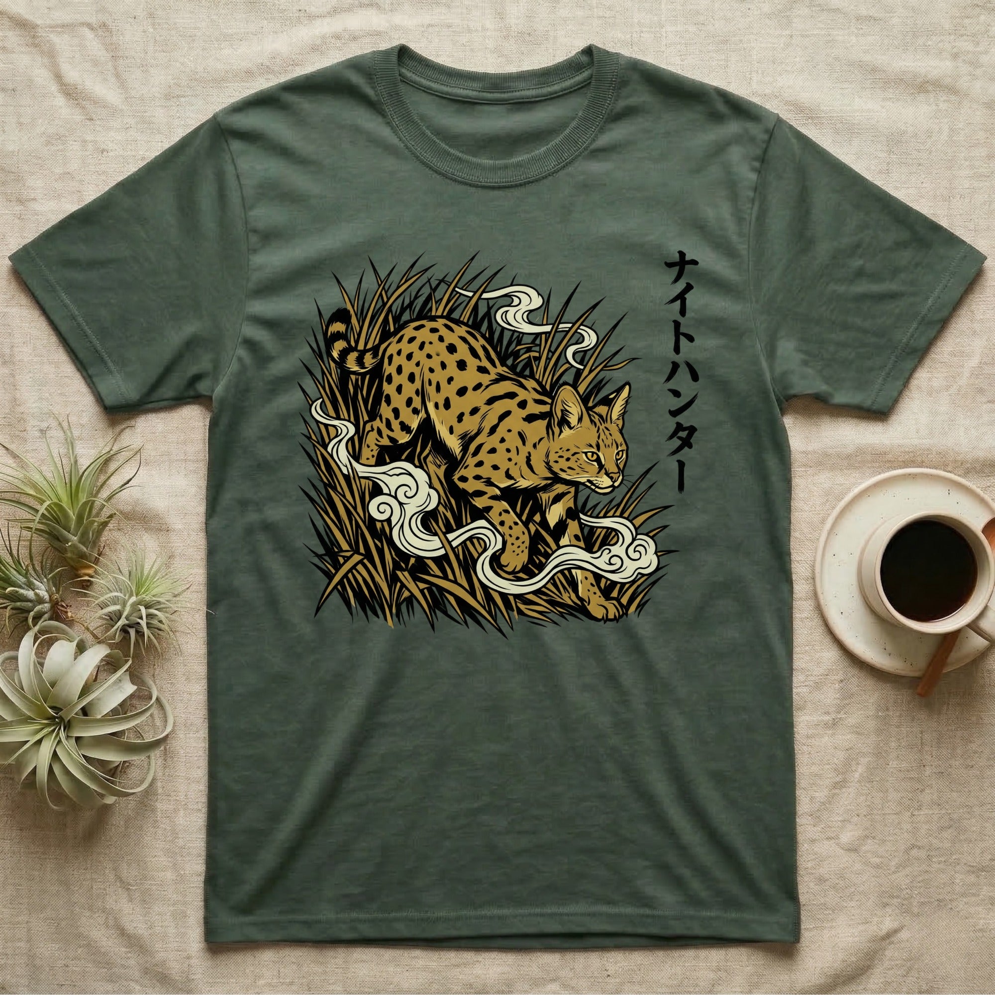 Green t-shirt with a serval cat illustration and Japanese text.