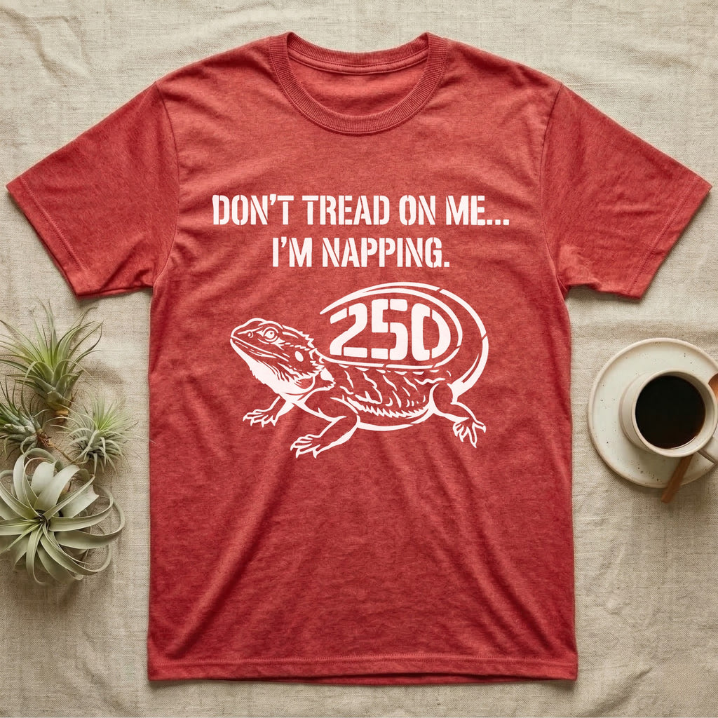 Bearded Dragon Napping T-Shirt in Heather Red — White stencil bearded dragon resting with 250 cut into the tail under text Don't Tread On Me, I'm Napping.