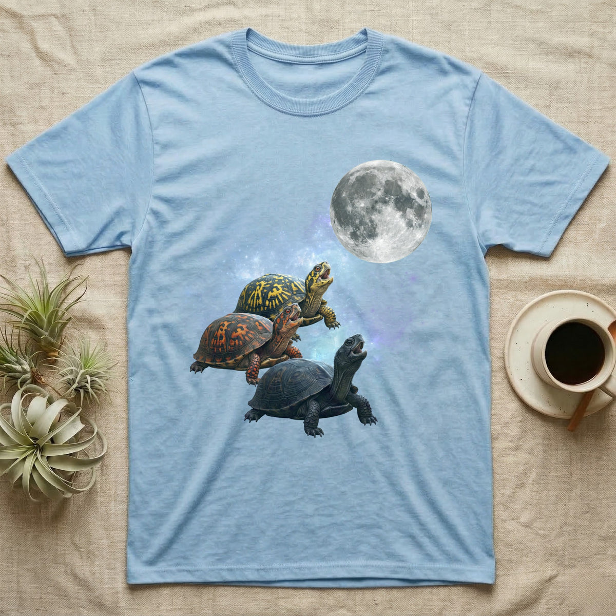 Eastern Box Turtle Moon Howl T-Shirt in Light Blue — Three Eastern Box Turtle colour morphs howling at a full moon over a nebula on a dark grey t-shirt.