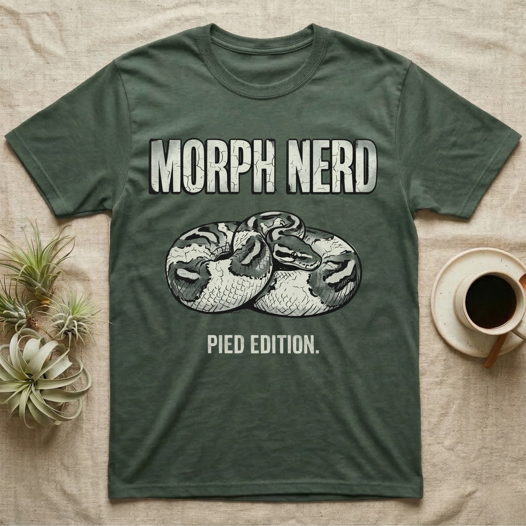 Pied Ball Python Morph T-Shirt in Military Green — Grunge type "Morph Nerd" with a small pied-morph ball python coiled mid-design and "Pied Edition" caption beneath.