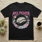 Apex Predator Isopod T-Shirt in Black — Bootleg design of a cute isopod in a floral wreath under dripping death-metal lettering reading "Apex Predator."