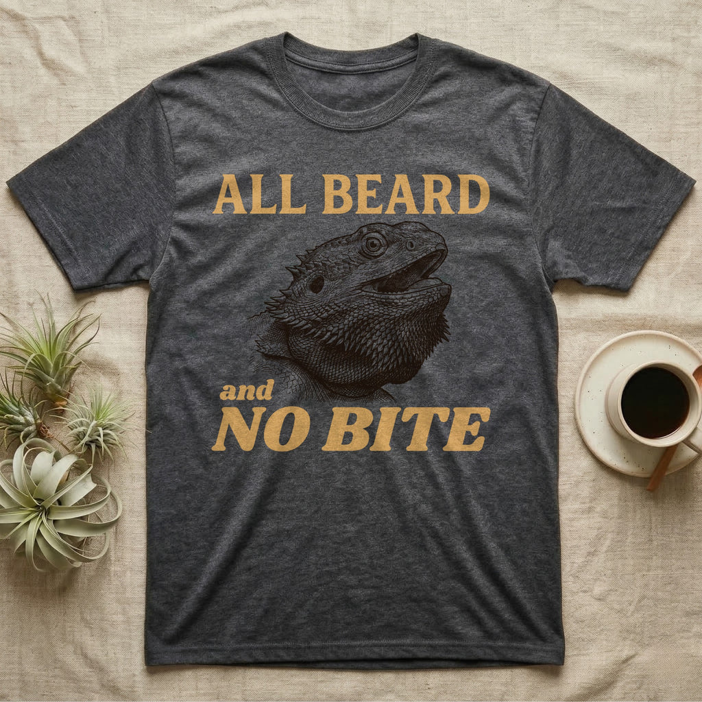 Bearded Dragon Bluff T-Shirt in Dark Heather — Engraved bearded dragon with a puffed dark beard and open mouth under sand lettering reading ALL BEARD and NO BITE