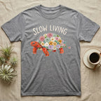 Red-Foot Tortoise Slow Living T-Shirt in Sport Grey — Flat watercolour mosaic of a red-foot tortoise built entirely from terrarium flowers and ferns.