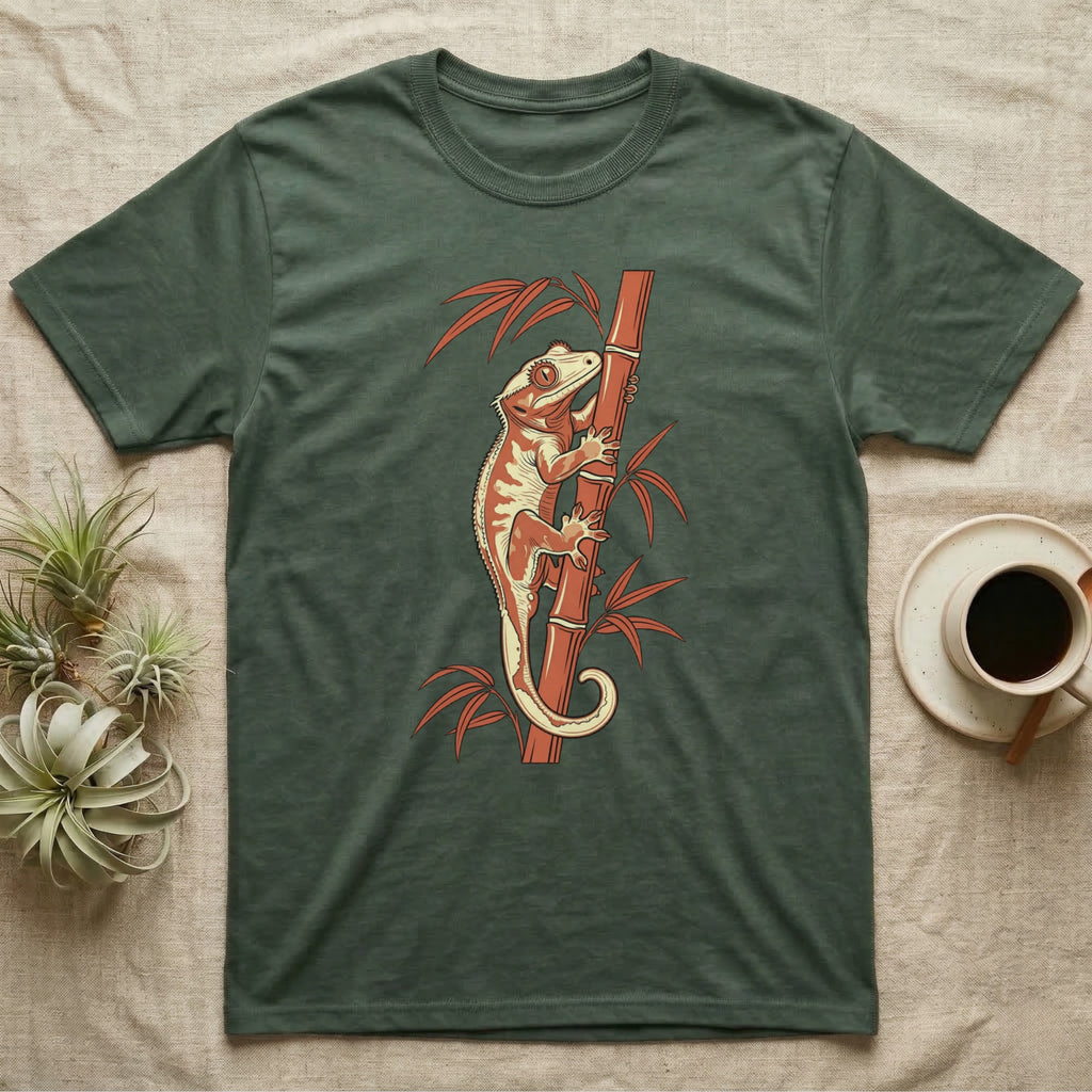 Green t-shirt with a crested gecko climbing a bamboo stalk.