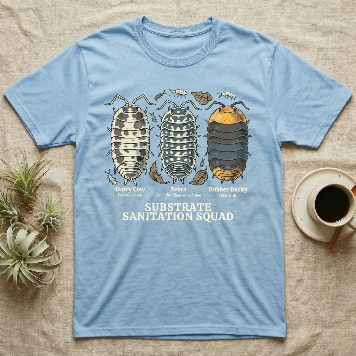 Isopod Substrate Sanitation Squad T-Shirt in Light Blue — Engraved chart of dairy cow, zebra and rubber ducky isopods labelled with their scientific names.
