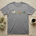 White's Tree Frog Canopy Crew T-Shirt in Sport Grey — Watercolor illustration of seven White's tree frogs in different colour phases on a eucalyptus branch, dark grey T-shirt design.
