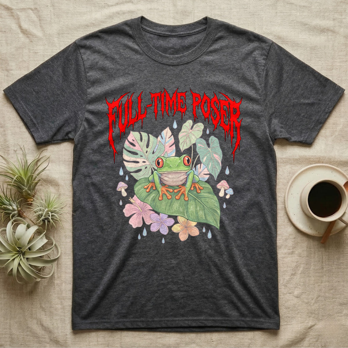 Red-Eyed Tree Frog Feral T-Shirt in Dark Heather — Red-eyed tree frog on a leaf in a pastel jungle scene under a spiky red metal wordmark reading FULL-TIME POSER.