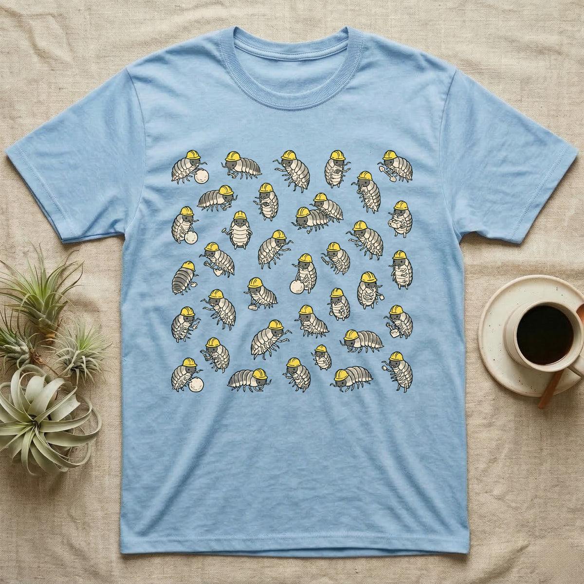 Isopod Cleanup Crew T-Shirt in Light Blue — Flat all-over scatter of cheerful isopods in tiny hi-vis hard-hats as a bioactive cleanup crew on shift.