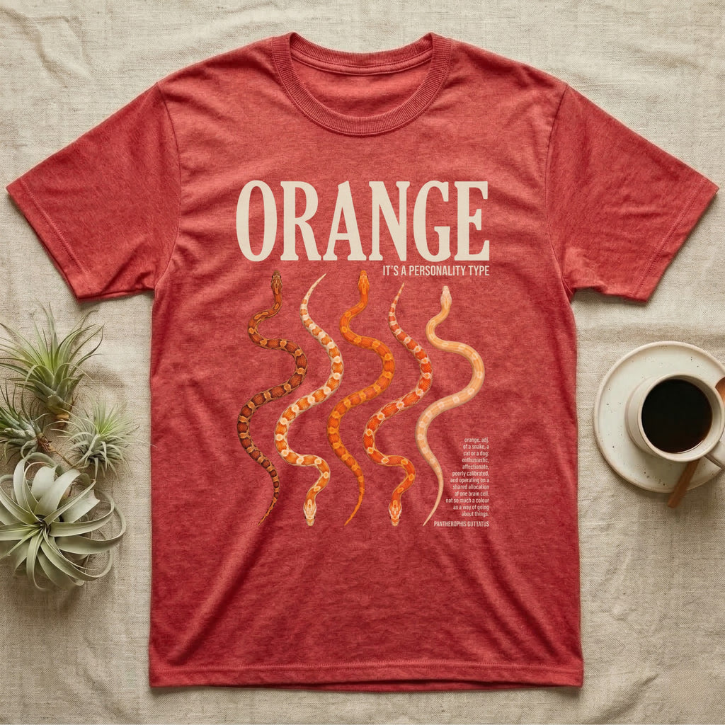 Corn Snake Morphs Orange Personality T-Shirt in Heather Red — Photo collage of seven orange corn snake morphs beneath a large serif headline and a dictionary block.