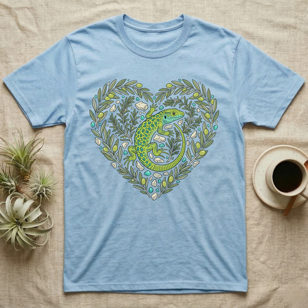 Light blue t-shirt with green lizard and olive branches forming a heart.