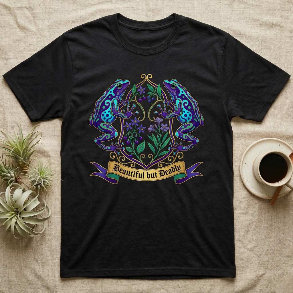 Black t-shirt featuring stylized blue and purple frogs on a floral banner reading "Beautiful but Deadly".