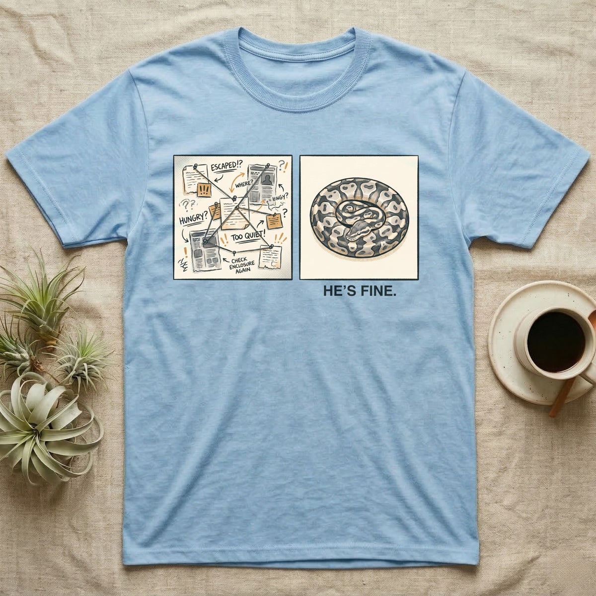 He's Fine Ball Python T-Shirt in Light Blue — Two-panel illustration of a frantic conspiracy board beside a serene coiled ball python captioned "He's Fine."