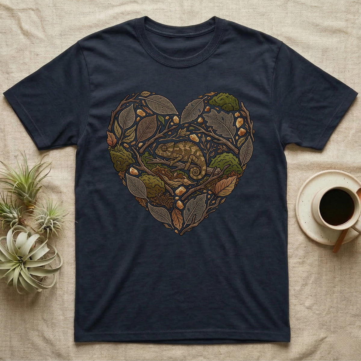 Dark navy t-shirt with a heart-shaped nature design featuring a chameleon.