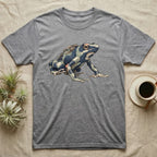 Dart Frog Tadpole T-Shirt in Sport Grey — Naturalist-plate illustration of a dyeing dart frog carrying tadpoles on its back with a dry typewriter caption beside it.