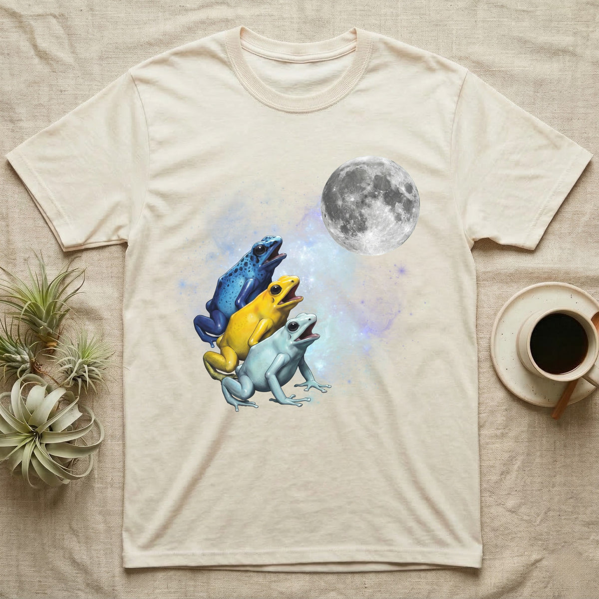 Poison Dart Frog Moon Howl T-Shirt in Natural — Three Poison Dart Frog colour morphs howling at a full moon over a nebula on a dark grey t-shirt.
