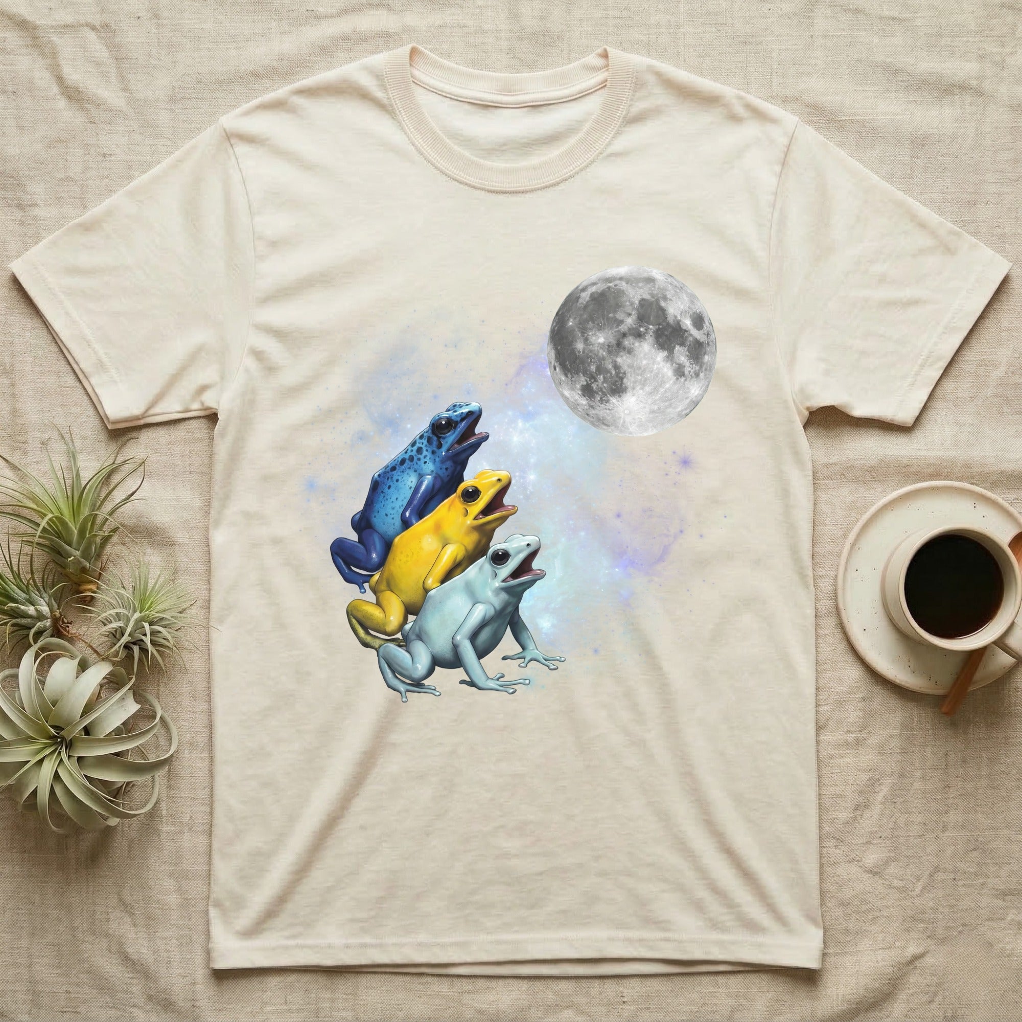 Poison Dart Frog Moon Howl T-Shirt in Natural — Three Poison Dart Frog colour morphs howling at a full moon over a nebula on a dark grey t-shirt.