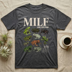 Vietnamese Mossy Frog MILF T-Shirt in Dark Heather — Seven Vietnamese mossy frogs in a cut-out photo collage beneath the huge cream word MILF on grey.