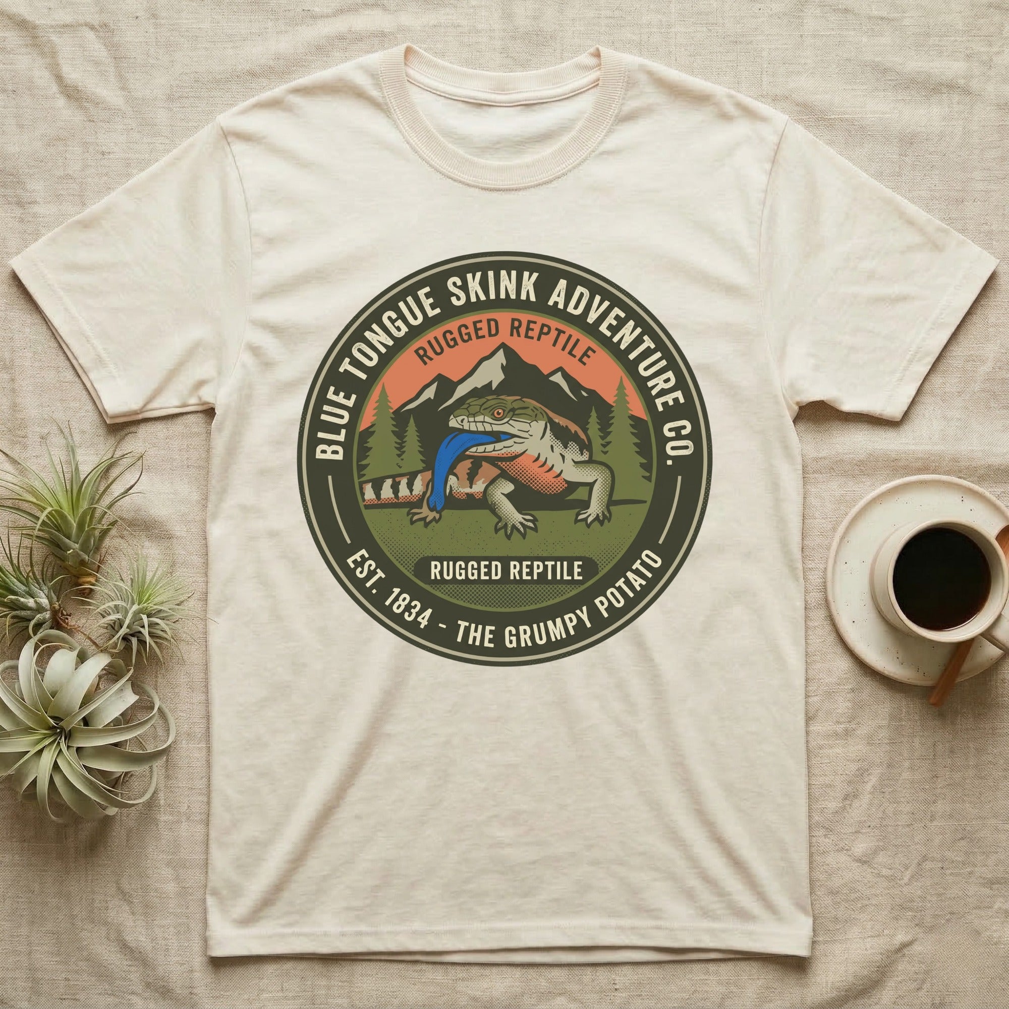 T-shirt with blue tongue skink and "Blue Tongue Skink Adventure Co." text.