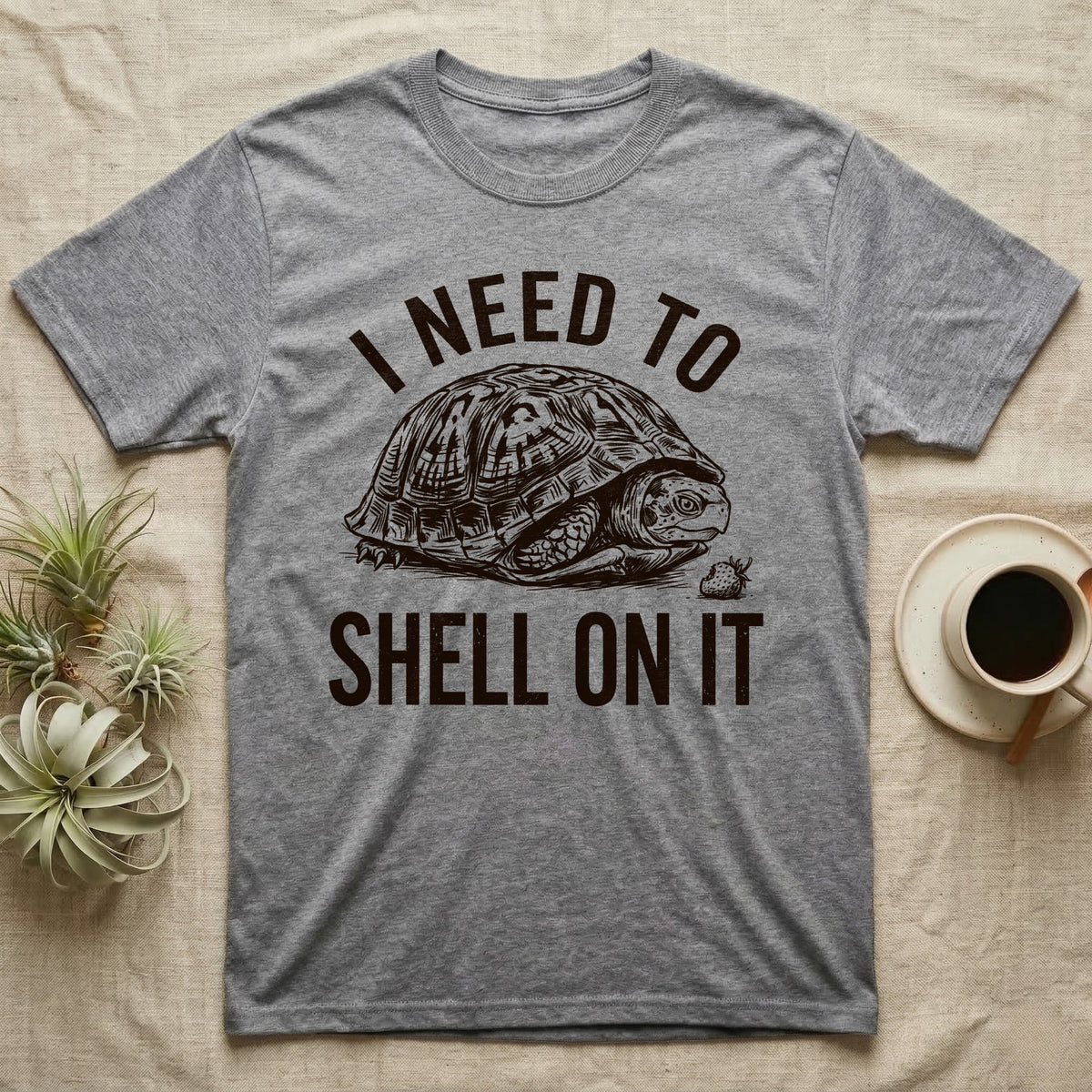 Box Turtle Overthinker T-Shirt in Sport Grey — Etching of a box turtle half-closed in its shell beside a strawberry, under I NEED TO, above SHELL ON IT