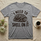 Box Turtle Overthinker T-Shirt in Sport Grey — Etching of a box turtle half-closed in its shell beside a strawberry, under I NEED TO, above SHELL ON IT