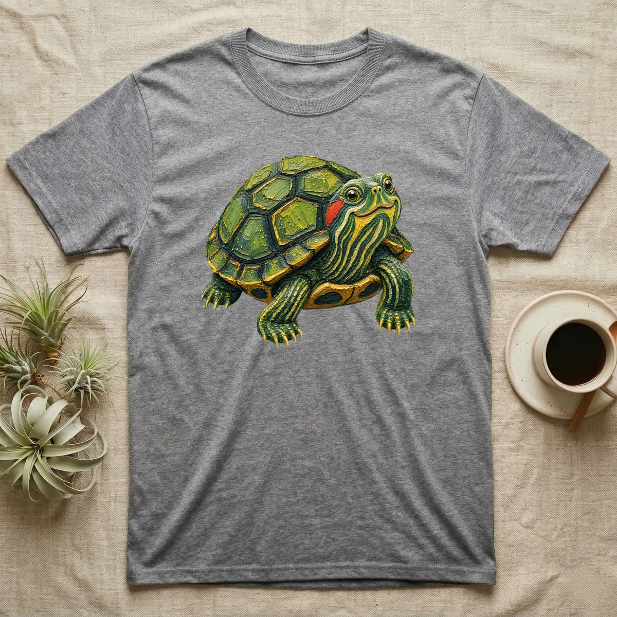 Gray t-shirt featuring a painted red-eared slider turtle graphic.
