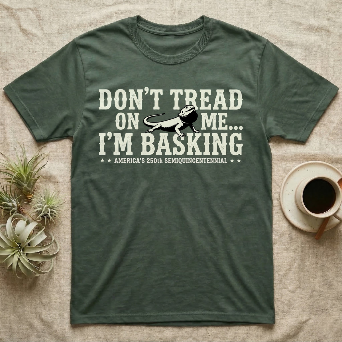 Bearded Dragon Basking Silhouette T-Shirt in Military Green — Cream bearded dragon silhouette nested into distressed block text reading Don't Tread On Me, I'm Basking.