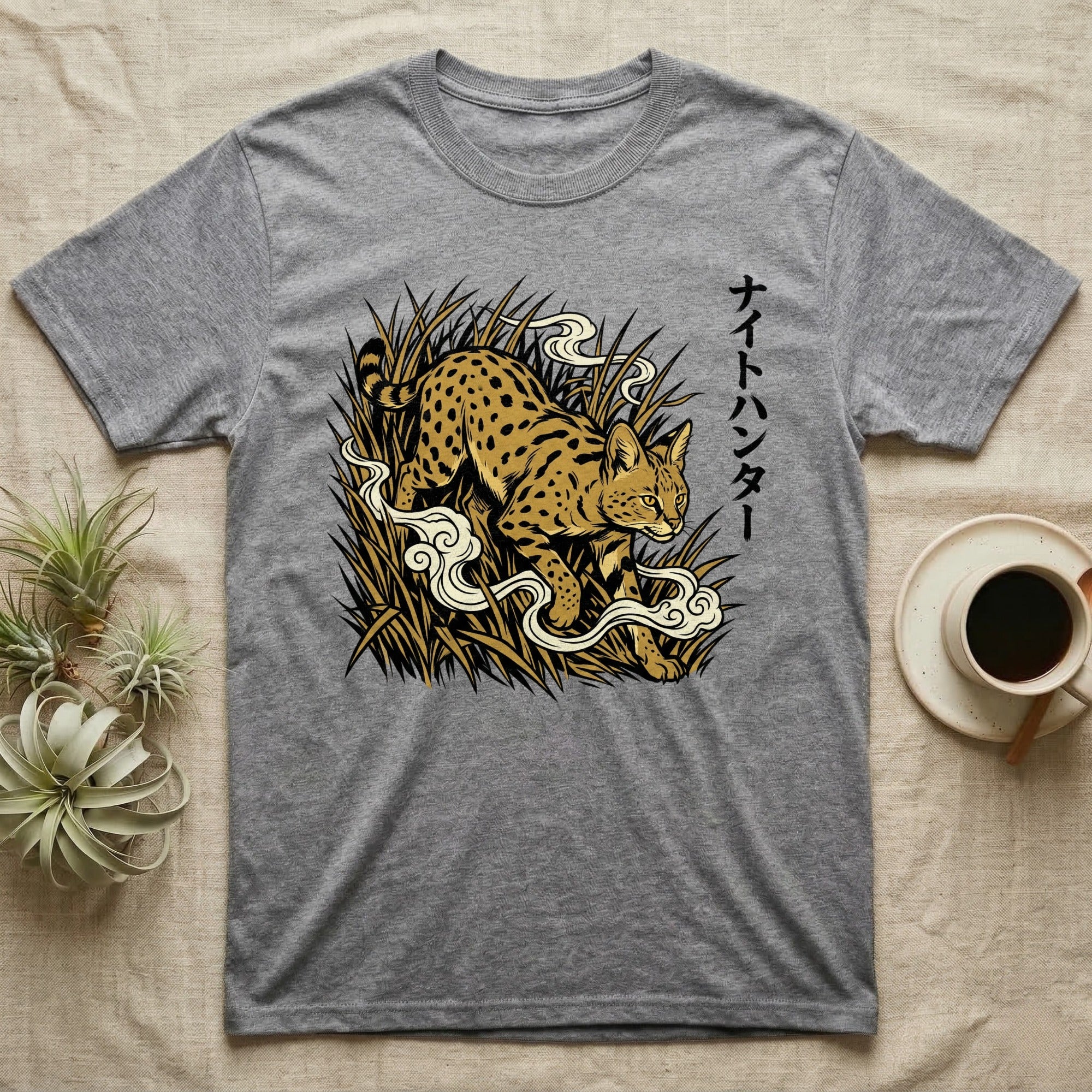 Grey t-shirt with spotted wildcat and Japanese text design.