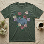Green t-shirt with a heart-shaped floral design featuring a grey cat.
