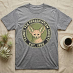 Grey t-shirt with a circular Fennec Fox Preservation Society logo.