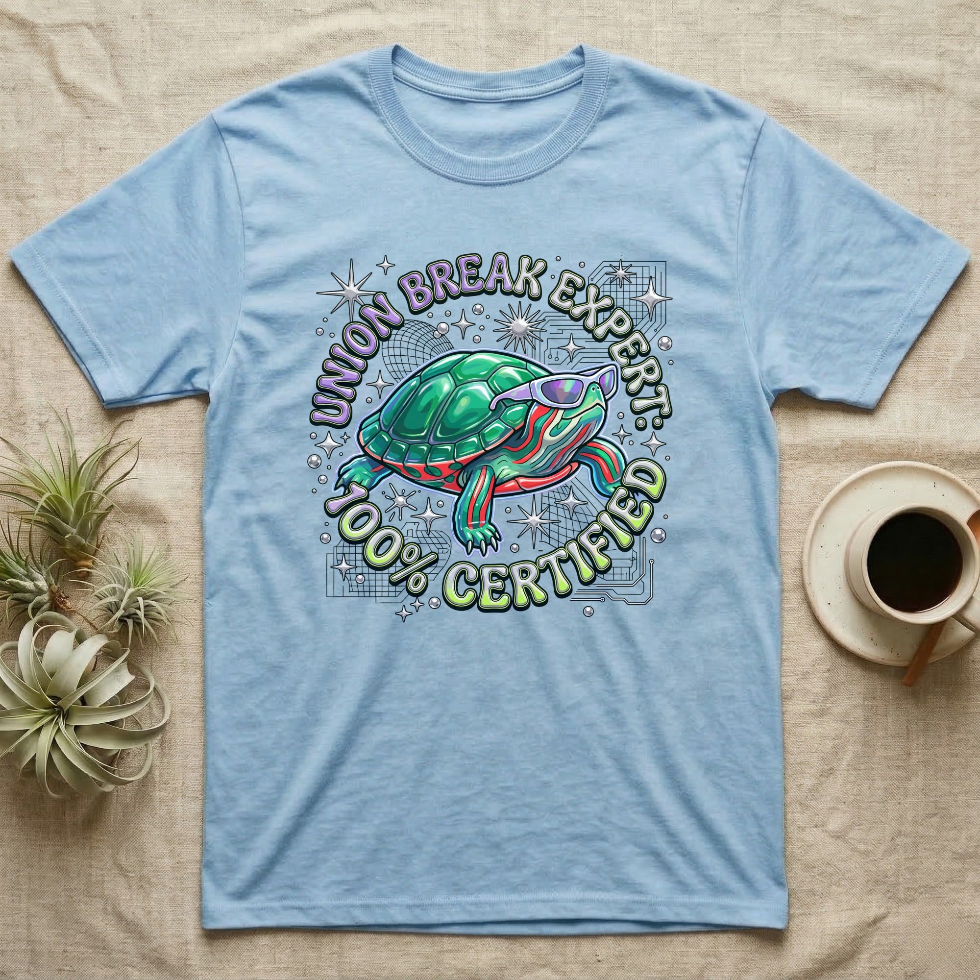 Red-Eared Slider Union Break T-Shirt in Light Blue — Y2K cartoon red-eared slider turtle in sunglasses with chrome "Union Break Expert 100% Certified" lettering.