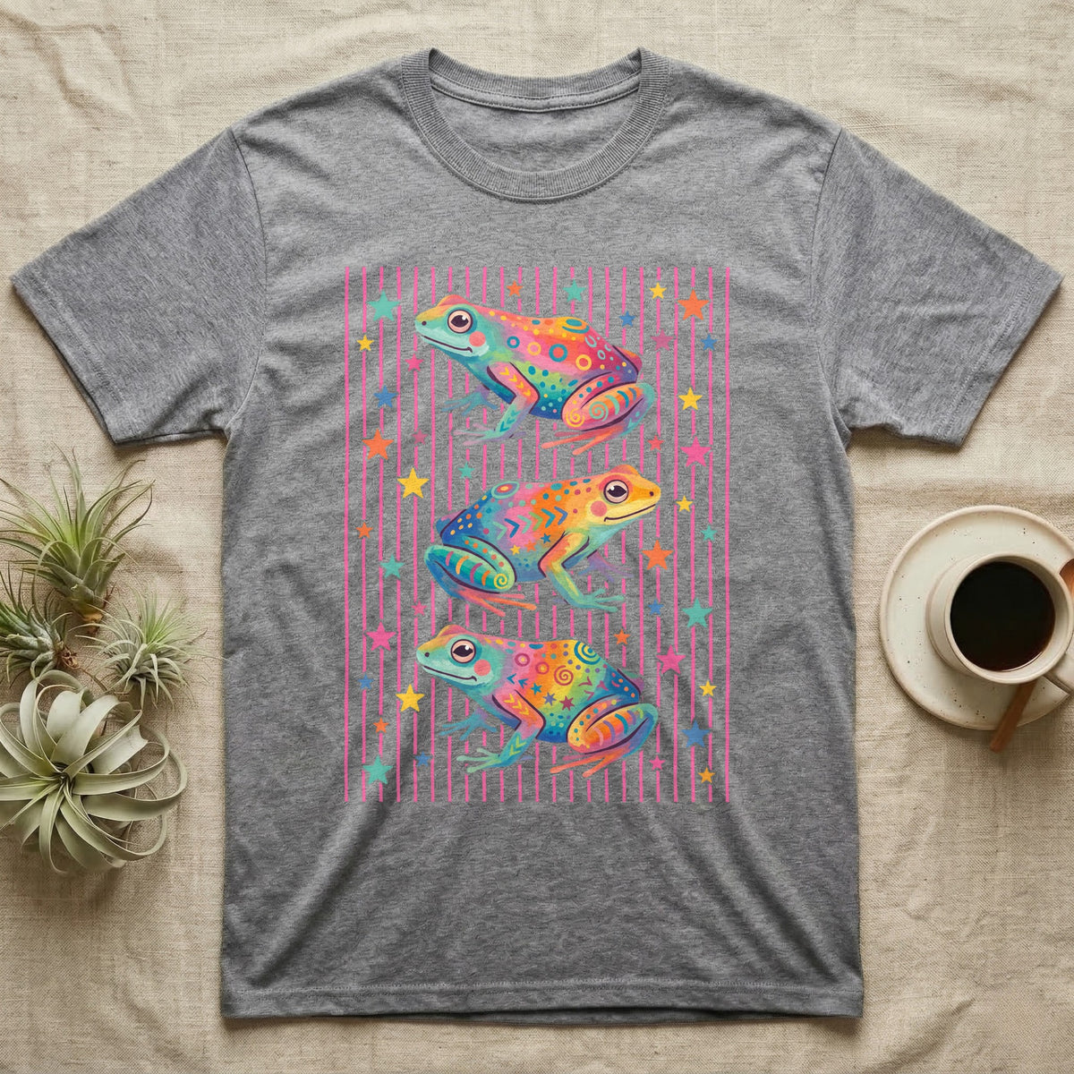 Dart Frog Disco Stripes T-Shirt in Sport Grey — Three rainbow poison dart frog morphs stacked on a pink-and-cream candy-stripe field with scattered stars.