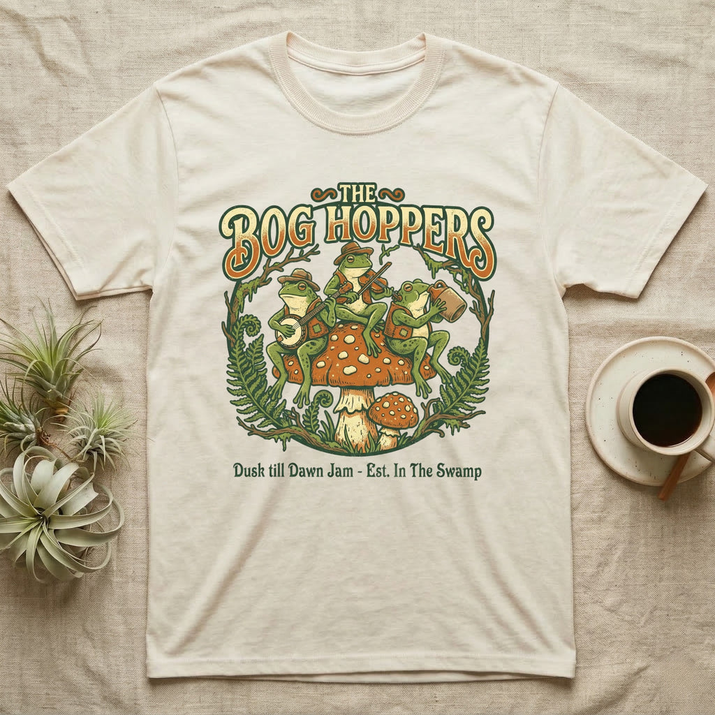 The Bog Hoppers band logo with frogs playing instruments on a mushroom.