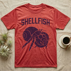 Hermit Crab Shellfish T-Shirt in Heather Red — Worn purple one-ink print of a hermit crab hugging a big spare shell to its chest under the word Shellfish