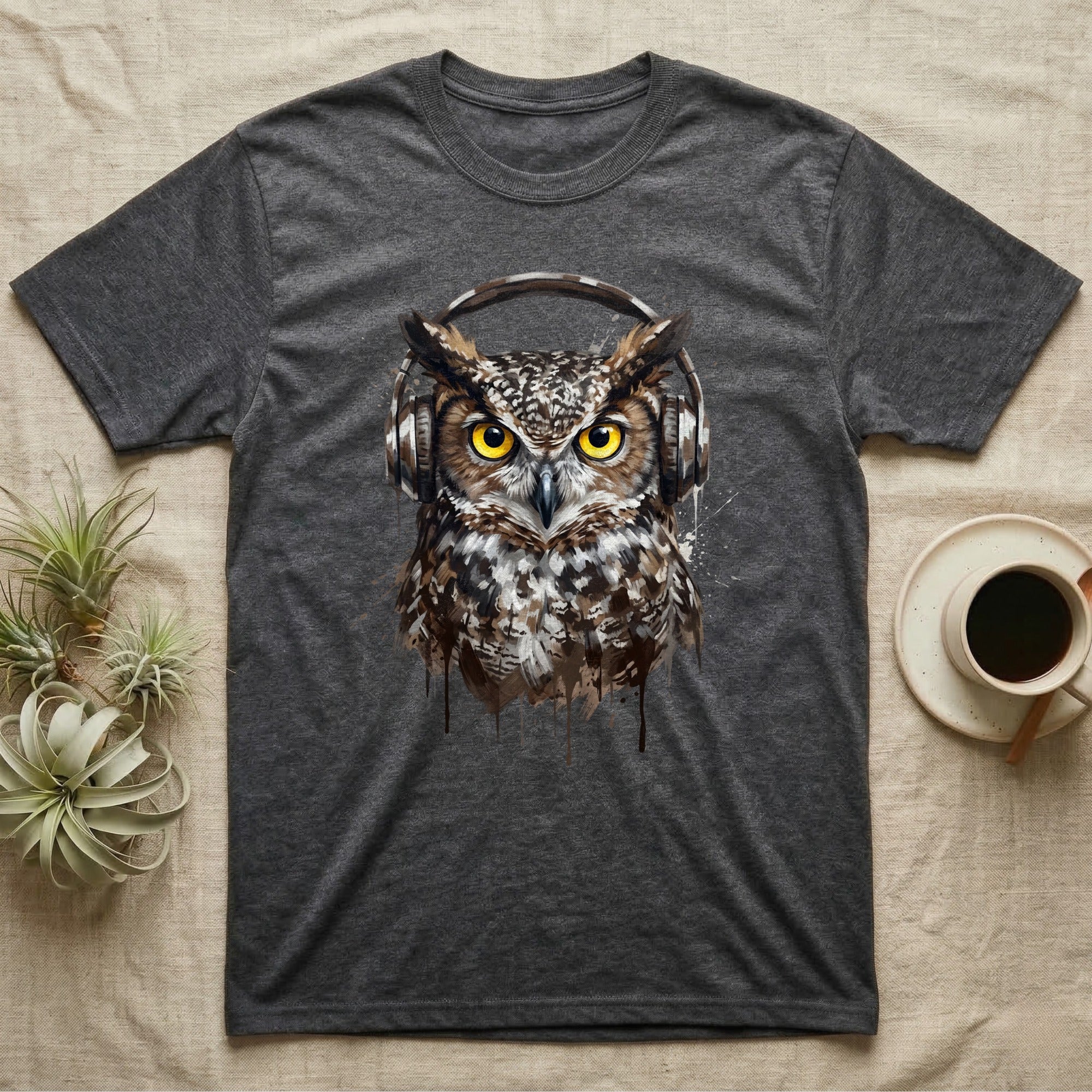 Dark gray t-shirt with a painted owl wearing headphones.