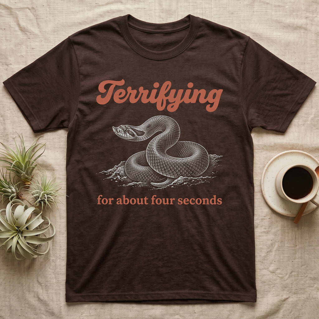 Western Hognose Terrifying T-Shirt in Dark Chocolate — White-line engraving of a western hognose snake coiled mid-bluff under orange script reading Terrifying