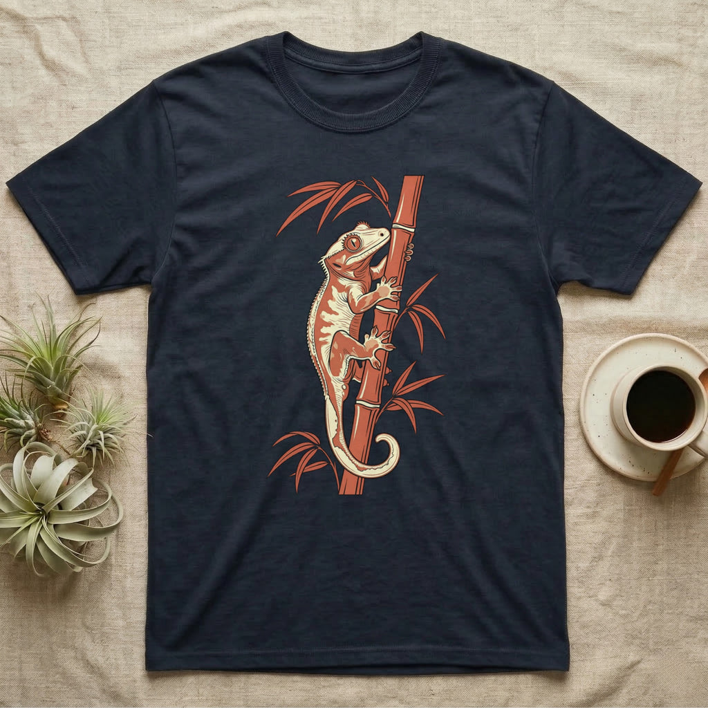 Dark t-shirt with a crested gecko on bamboo illustration.