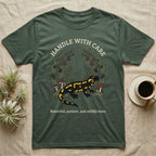 Fire Salamander Poison Plate T-Shirt in Military Green — Naturalist apothecary-plate illustration of a fire salamander framed by a symmetric wreath of woodland botanicals.