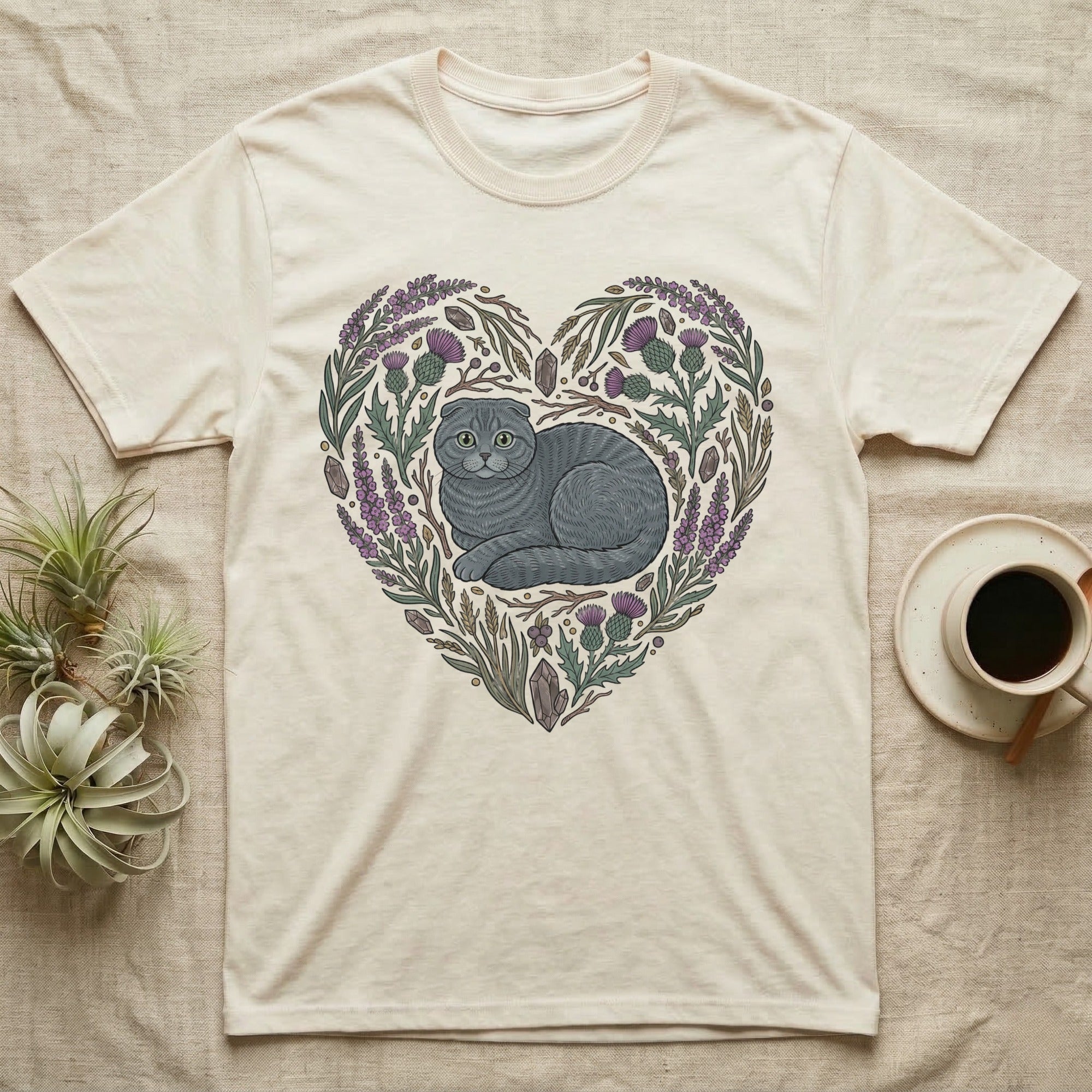 Cream t-shirt with heart-shaped floral design featuring a gray Scottish Fold cat.