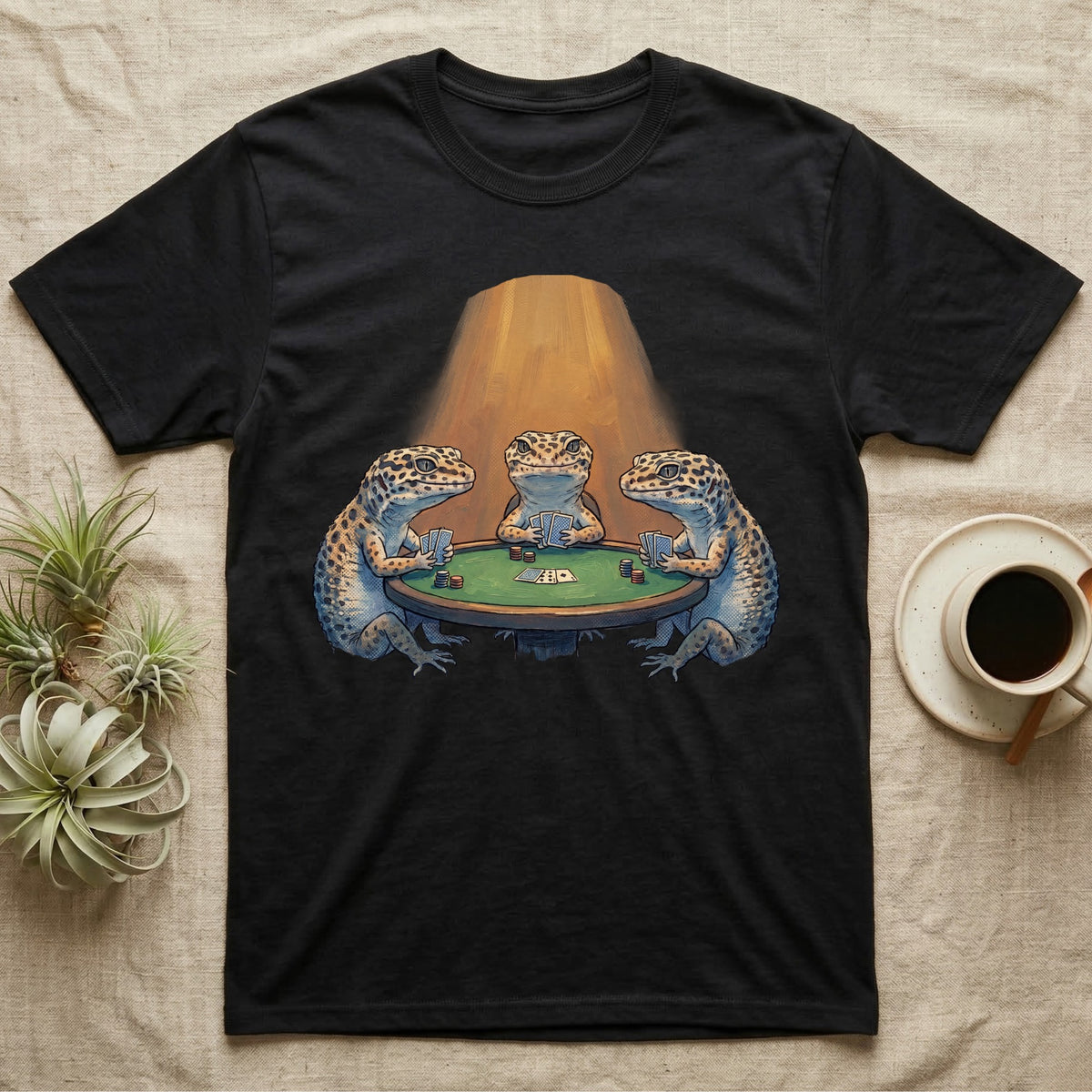 Leopard Gecko Poker T-Shirt in Black — Vintage oil-painting tableau of three leopard geckos playing poker around a green-felt table in warm amber light.