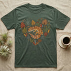 Green t-shirt with a heart-shaped design of a gecko and desert plants.