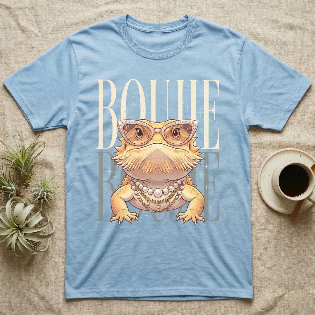 Light blue t-shirt with a bearded dragon wearing sunglasses and jewelry.